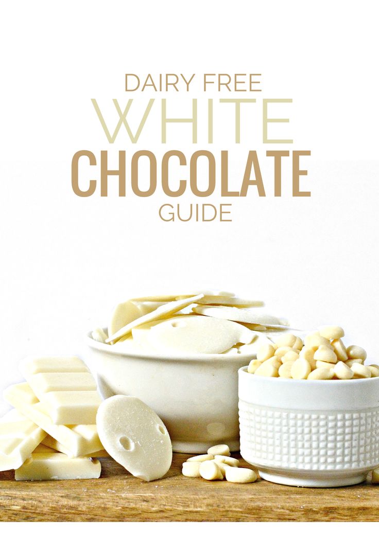 dairy free white chocolate guide on a wooden table with bowls and spoons next to it