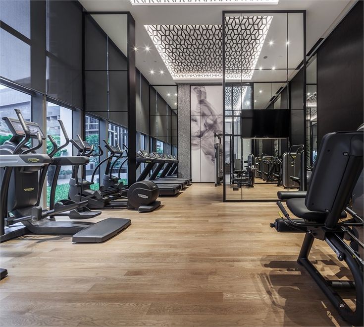 a gym with treadmills and exercise machines