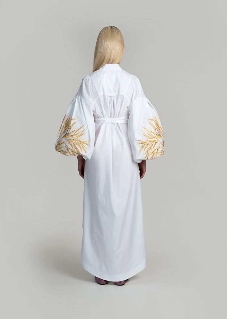 Luxurious White/Gold Kolossya Women's Midi Caftan Yuliya Magdych Elegant Spring Kaftan With Embroidered Sleeves, Traditional Cotton Dress With Embroidered Sleeves, Elegant Cotton Kimono, Cotton Kaftan With Geometric Embroidery, White Cotton Dress With Embroidered Sleeves, Elegant Floral Embroidered Kaftan With Kimono Sleeves, Elegant Kaftan With Floral Embroidery And Kimono Sleeves, Elegant Summer Cotton Kaftan, White Long Sleeve Kaftan With Woven Motifs