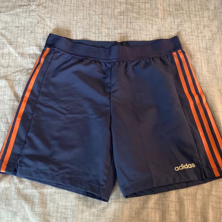 Adidas Athletic Shorts | Climalite Color: Blue W/Orange Stripes Elastic Waistline Size: M Usa/Uk These Shorts Are Super Lightweight. Comfortable To Wear 100% Polyester Blue Adidas Athletic Shorts For Training, Adidas Blue Athletic Shorts For Training, Adidas Blue Shorts For Gym, Adidas Blue Gym Shorts, Adidas Blue Shorts For The Gym, Adidas Blue Athletic Shorts For Sports, Adidas Casual Athletic Shorts With Go-dry Technology, Adidas Casual Athletic Shorts With Go-dry, Adidas Blue Athletic Shorts