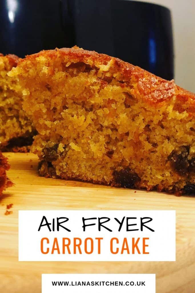 an air fryer carrot cake cut in half on a cutting board with text overlay