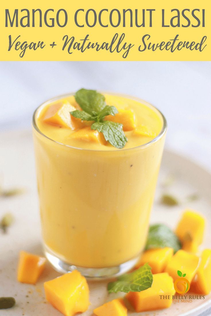 mango coconut lass in a small glass on a plate