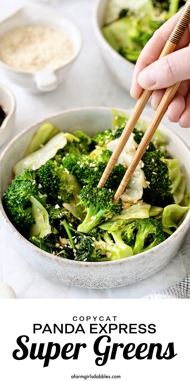 a person holding chopsticks over a bowl of broccoli