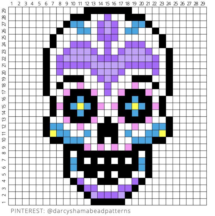 a cross stitch skull is shown in purple and blue colors, as well as numbers