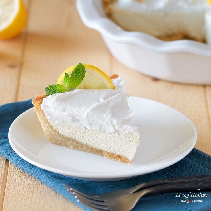 a slice of lemon pie on a white plate