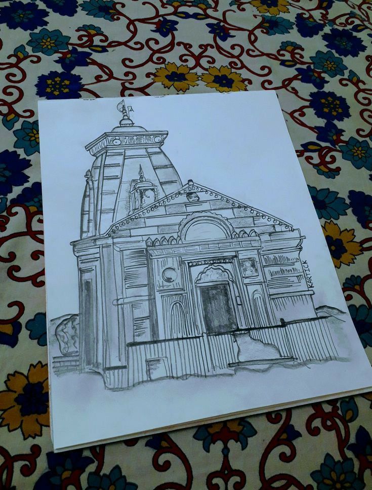 a drawing of a building on top of a table