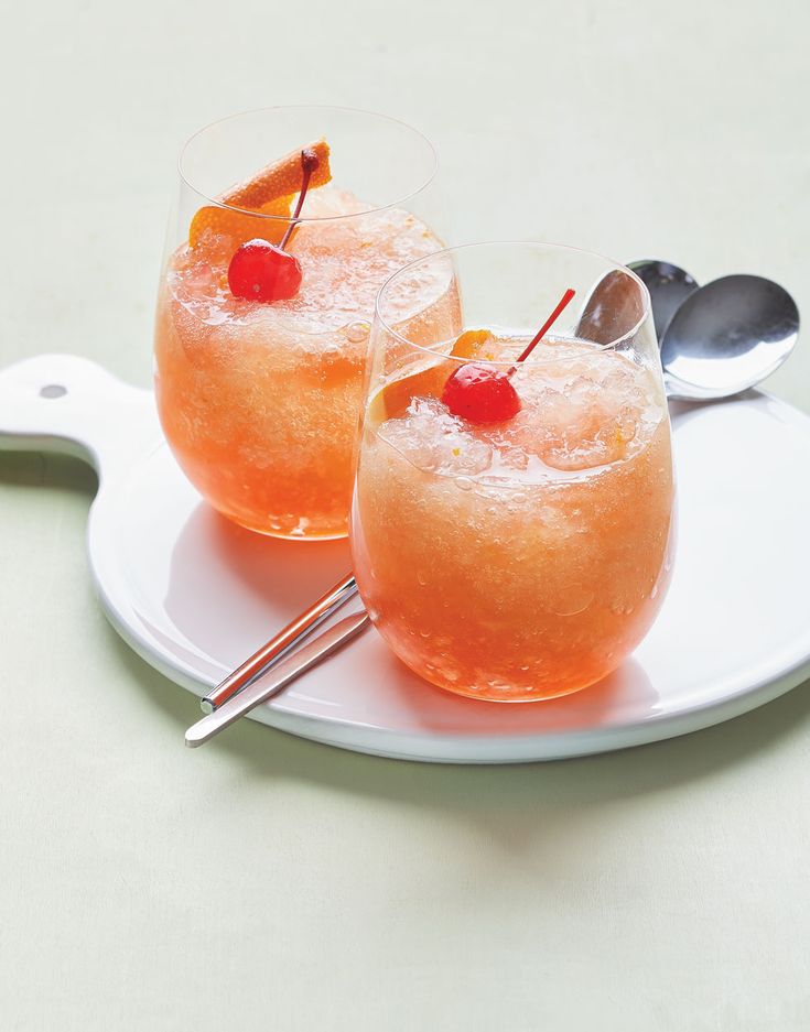 two frozen old fashioned cocktails on a white plate