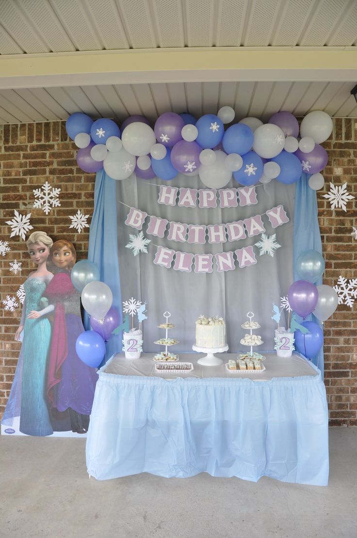 a frozen princess themed birthday party with balloons