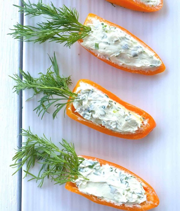 four stuffed peppers with cream cheese and dill