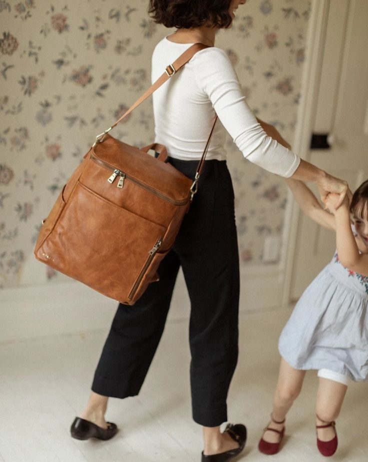 La Mère Grand - Diaper Bag Backpack | Azaria Leather Diaper Bag Backpack, Leather Diaper Bag, Unisex Looks, Mom Bags, Spring Capsule, Diaper Bag Backpack, Backpack Straps, Laptop Pocket, Perfect Bag