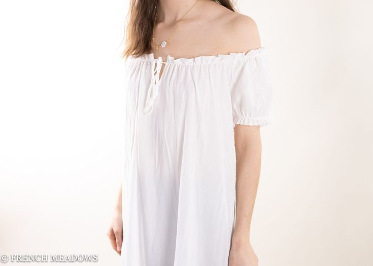 This cotton chemise is a must-have for any Cottage Core dreamer or romantic! This chemise is a bit more simple than our Lacey Cotton Chemise, but with the same great quality and details. An elasticized neckline creates a small ruffle, and the neckline can be worn on or off the shoulders. This super soft cotton ... Ruffled Puff Sleeve Peasant Dress, Summer Peasant Dress With Puff Sleeves, Elegant Spring Peasant Dress With Puff Sleeves, Billowy Peasant Dress For Daywear, Elegant Peasant Dress For Daywear, Off-shoulder Peasant Dress For Summer, Off-shoulder Daywear Dresses With Ruffles, Off-shoulder Ruffle Dresses For Daywear, Puff Sleeve Peasant Dress With Ruffles For Daywear