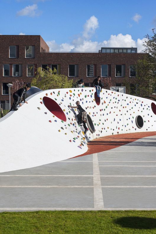 the skateboarder is doing tricks on the ramp