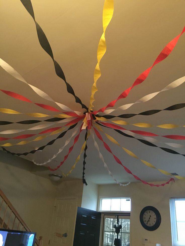 the ceiling is decorated with ribbons and streamers