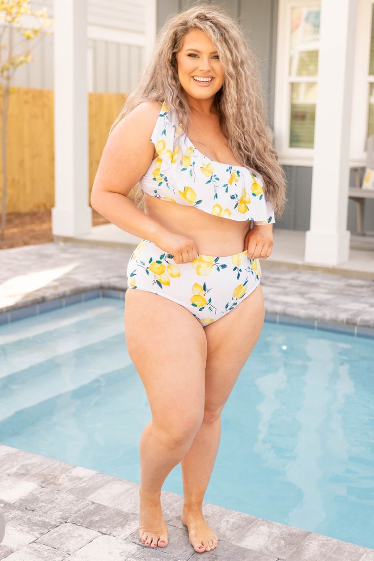 Throw this swimmie on and sit on the beach until sunset! This cutie has a super sweet lemon pattern with a one shoulder fit to keep you chic all season long! Style it with the matching bottom and sunnies for a fun in the sun look! 82% Polyamide, 18% Elasthane Uv Protection Swimwear For Summer Beach Activities, Summer Swimwear With Uv Protection, Summer Swimwear With Upf 50+, Uv Protection Swimwear For Summer Activities, Upf 50+ Summer Swimwear, White Swimwear With Uv Protection For Summer, White Swimwear With Uv Protection For Spring, Beachy Swimwear For Summer Activities, Summer Swimwear For Summer Activities