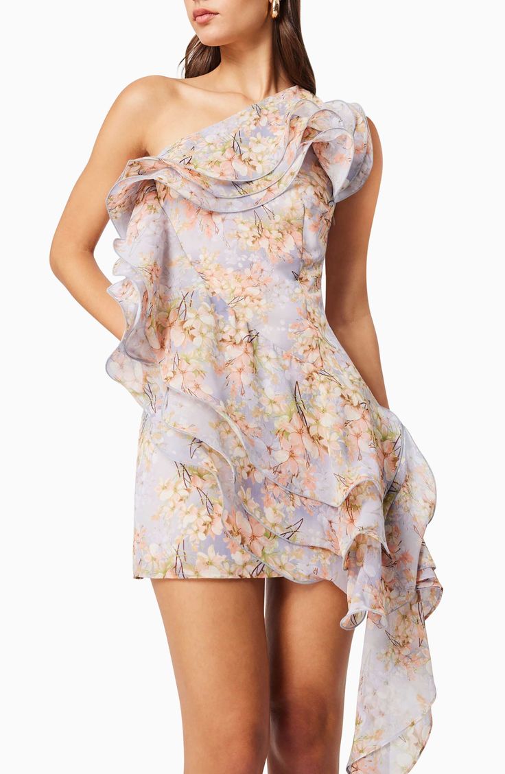 A rippling ruffle adds a festive feel to a blossom-tossed dress served in a leggy length. 32 1/2" to 51" length (size Medium) Hidden side-zip closure One-shoulder neck Lined 100% polyester Hand wash, dry flat Imported Spring Evening Off-shoulder Ruffle Dress, Spring Dresses With Ruffled Straps In Purple, Purple Dresses With Ruffled Straps For Spring, Purple Spring Dress With Ruffled Straps, Purple Spring Dresses With Ruffled Straps, Spring Purple Dresses With Ruffled Straps, Spring Evening Ruffle Dress With Ruffled Straps, Evening Ruffle Dress With Ruffled Straps For Spring, Purple Off-shoulder Dress For Spring