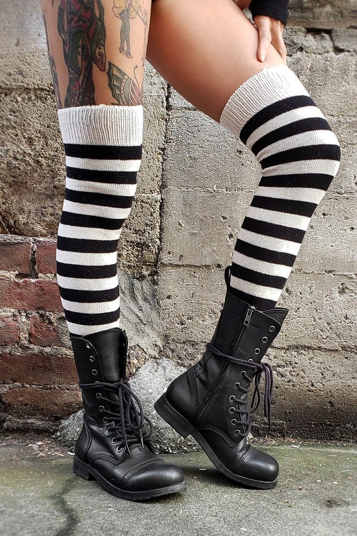 Horizontally striped, thigh high cotton socks with a classic Black and White stripe pattern, what could be better? Soft heavyweight cotton for a stylish and comfortable fit. Thigh high / OTK / Over the Knee Horizontally Ribbed One Size fits most 99% Cotton with less than 1% Nylon in the top of the cuff. Made in USA Shoes Available HERE *Due to the natural fiber content of these socks, they will not stay up long term on their own. To wear them as over the knee style, need to use garters or wear t Cute Thigh High Socks Outfit, Striped Socks Outfit, Socks Outfit Men, High Socks Outfits, High Knee Socks Outfit, Striped Thigh High Socks, Usa Shoes, Inclusive Fashion, Striped Tights