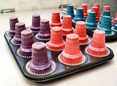 the game is ready to be played with plastic cups and other colorful objects on it