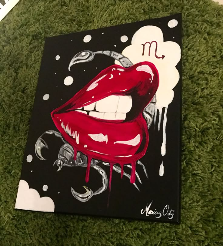 a painting of a woman's lips with the letter m painted on it