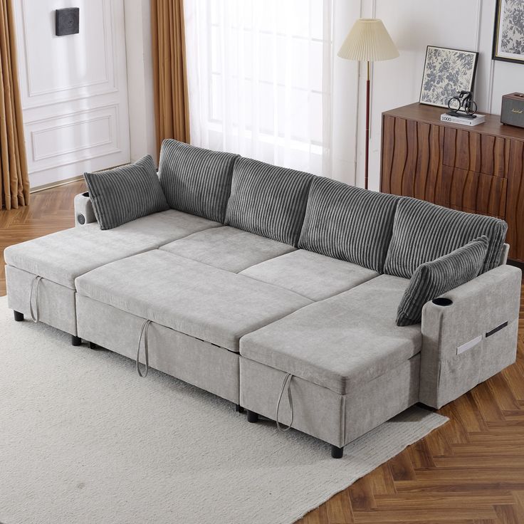 a living room with a large gray couch