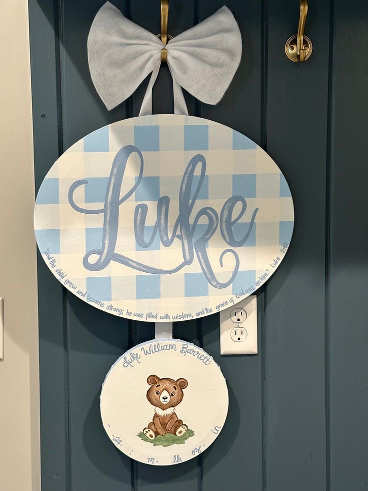 a blue and white door with a wooden sign that says lunke