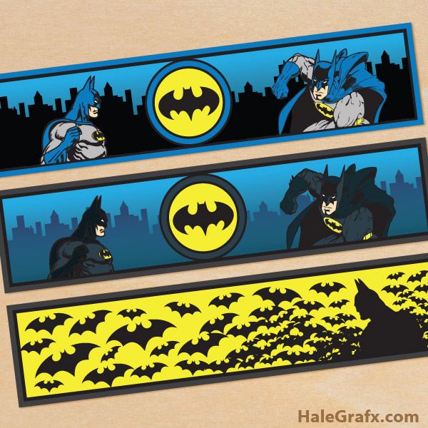 three batman themed bookmarks are shown in yellow and blue, with black silhouettes on them