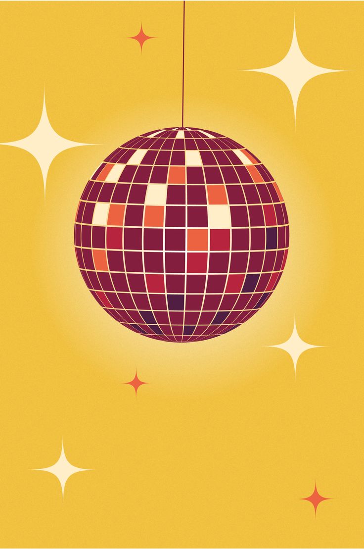 an orange and red ball hanging from a string on a yellow background with white stars