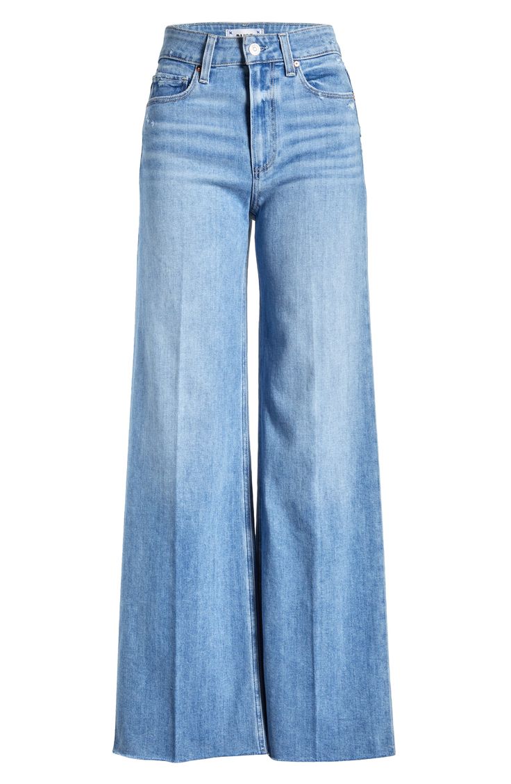 The faded wash and roughed-up edges of these wide-leg jeans offer an authentic rigid look, but the denim is surprisingly soft and stretchy with great recovery. 31" inseam; 22" leg opening; 13" front rise; 15" back rise (size 29) Zip fly with button closure Five-pocket style 93% cotton, 5% polyester, 2% spandex Machine wash, line dry Imported Chic Faded Flare Jeans For Spring, Chic Washed Blue Wide Leg Flare Jeans, Distressed Wide Leg Denim Flare Jeans, Faded Washed Cropped Flare Jeans, Faded Cropped Leg Flare Jeans For Fall, Spring Flare Faded Jeans, Spring Faded Flare Jeans, Distressed Wide Leg Flare Jeans In Medium Wash, Faded Wide Leg Washed Flare Jeans