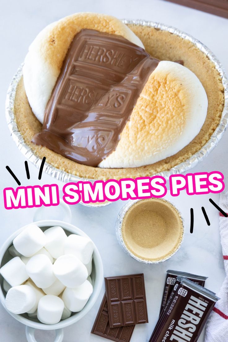 mini s'mores pie with chocolate and marshmallows in the middle