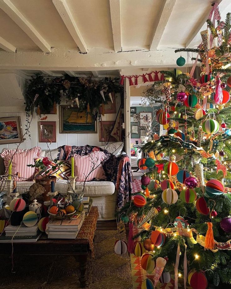 a living room filled with lots of christmas decorations