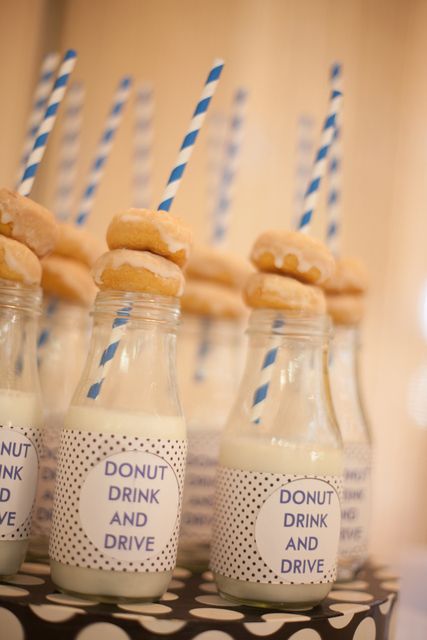 there are donuts and milk in the bottles