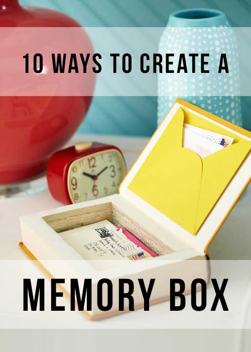 an open box sitting on top of a table next to a red vase and clock