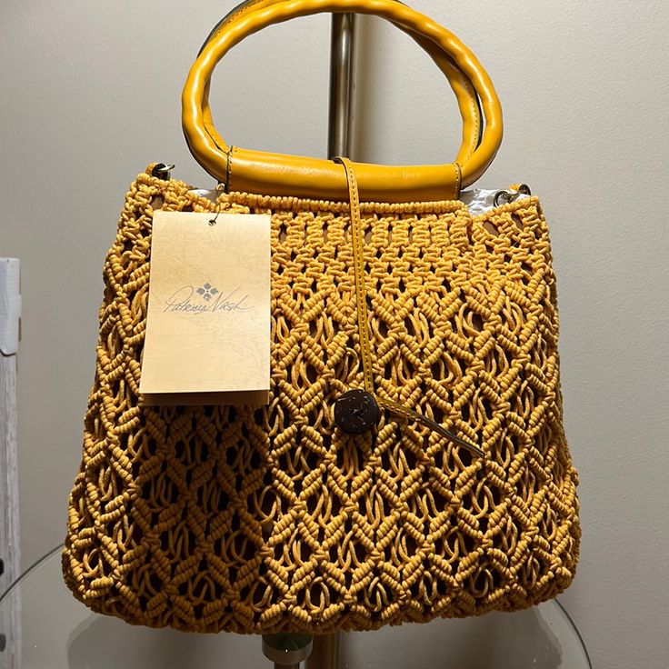 This Is A Stunning Hobo Bag With Leather Handles And A Long Chain For Crossbody Wear. Brand New With Tag. It Is Crocheted With A Soft Material On The Inside. Comes With Dust Bag. Pictures Show Sizing. Yellow Top Handle Bag For Daily Use, Chic Yellow Top Handle Bucket Bag, Yellow Crochet Tote Bag For Vacation, Casual Yellow Crochet Bag With Braided Handles, Casual Yellow Crochet Woven Bag, Yellow Bucket Bag With Braided Handles For Beach, Yellow Top Handle Shoulder Bag For Daily Use, Chic Yellow Rectangular Straw Bag, Daily Use Yellow Shoulder Bag With Top Handle