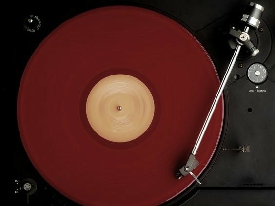 an old record player with its turntable removed from the top and on to the side