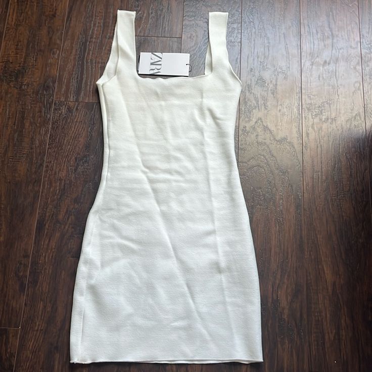 White Zara Mini Dress Size Small Brand New Fitted Solid Summer Midi Dress, Fitted Solid Color Summer Midi Dress, White Zara Bodycon Dress For Spring, White Stretch Dress With Straight Neckline, White Stretch Dresses With Straight Neckline, Casual White Sleeveless Dress With Square Neck, White Sleeveless Dress With Straight Neckline For Spring, Zara Fitted Summer Midi Dress, Zara Sheath Bodycon Dress For Spring