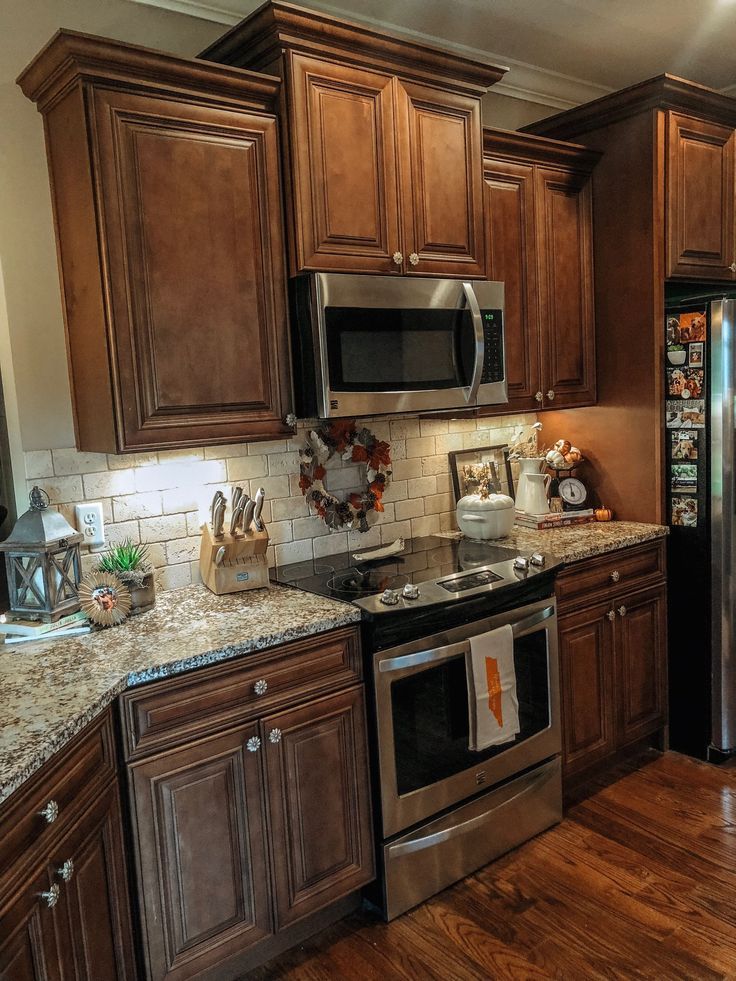 dark brown Kitchen Design Ideas - Decorating dark brown Kitchens Cabinet (paid link) Farmhouse Kitchen With Brown Cabinets, Dark Brown Kitchen Cabinets Decor Ideas, Brown Kitchen Decor Ideas, Kitchen Remodel Brown Cabinets, Backsplash Brown Cabinets, Kitchen Backsplash Ideas Brown Cabinets, U Shaped Kitchen Island, Brown Kitchen Decor, Dark Brown Kitchen Cabinets