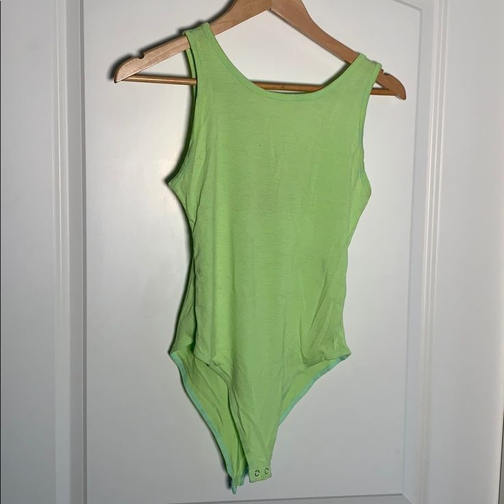 Neon Green/Yellow Striped Bodysuit. Never Worn. Good Condition. Very Cute And Comfortable. Trendy Green Stretch Bodysuit, Green Cotton Bodysuit For Spring, Green Sleeveless Bodysuit For Spring, Sleeveless Green Bodysuit For Spring, Green Stretch Summer Bodysuit, Casual Green Stretch Bodysuit, Yellow Cotton Bodysuit For Summer, Green Stretch Bodysuit For Spring, Forever 21 Sleeveless Bodysuit For Spring