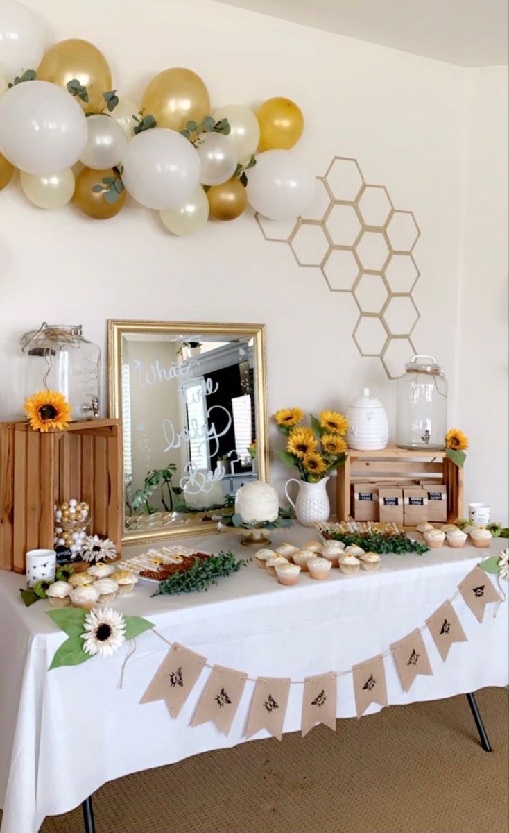 Gold & White Bee gender reveal with sunflowers and eucalyptus Bee Themed Gender Reveal, What Will Baby Bee, Gender Reveal Baby Shower Themes, Baby Gender Reveal Party Decorations, Honey Bee Baby Shower, Bee Gender Reveal, Gender Reveal Party Theme, Gender Reveal Themes, Grey Baby Shower