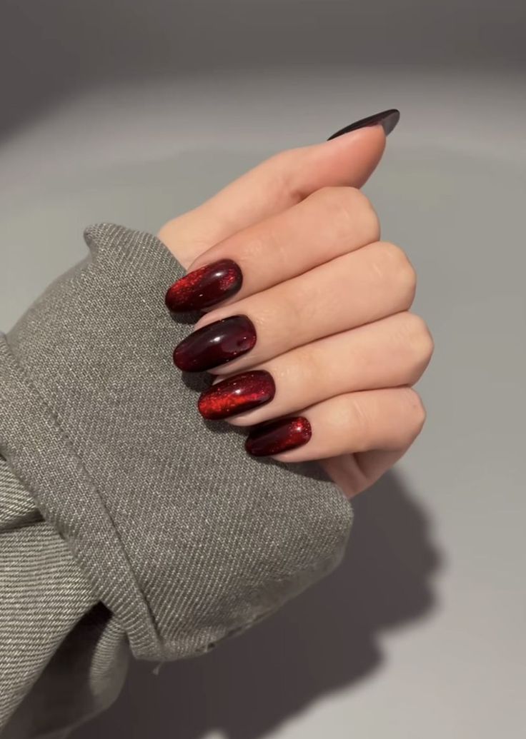 Black And Red Magnetic Nails, Red Cats Eye Nails Design, Black And Red Cats Eye Nails, Dark Red Cats Eye Nails, Cat Eye Nails Fall Colors, Red Cat Eye Gel Nails, Cat Eye Dark Red Nails, Cat Eyes Red Nails, Black Nails With Red Cat Eye