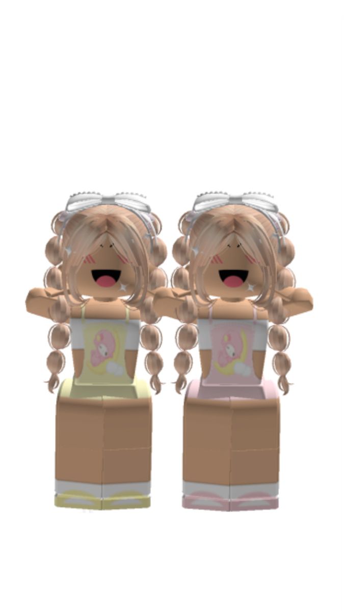 two legos are standing next to each other in front of a white background and one has blonde hair