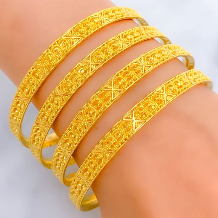 Festive Shiny Beadwork 22k Gold Bangles Traditional Yellow Bangle Bracelet, Yellow Bangle Bracelets For Ceremonial Occasions, Yellow Bangle Bracelets For Festivals, Festive Yellow Bangle Bracelet, 22k Gold Bracelets With Intricate Design For Festive Season, 22k Gold Bracelets With Intricate Design For Festivals, Yellow Gold Bangle For Festivals, Festive Yellow Bangle Jewelry, 22k Gold Filigree Bracelets For Festivals