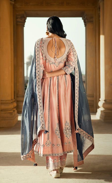 Editor's Note Inspired By A Potpourri Of Vintage Crafts Of Zardozi, Hand Appliqués & Resham Ari, “the Humble Tales Of Alwar” Is A Reminiscent Story Of Evolution. Timeless Flared Kurta With Delicate Filigree Embroidery On The Neck And Sleeves, The Riwaaz Anarkali In Pink Has Front Yoke With Keyhole On The Neckline. The Silhouette Has Kalis With Detailed Hand Embroidered Motifs On The Hem Of Resham Thread, Sequins And Motiya Pittan. Set Is Completed By Comfortable Straight Palazzo Pants And A Cont Anita Dongre Suits, Silk Kurta Set, Pink Anarkali, Blouse Yoke, Silk Anarkali, Designer Anarkali Suits, Silk Kurta, Embroidered Pants, Ethnic Outfits