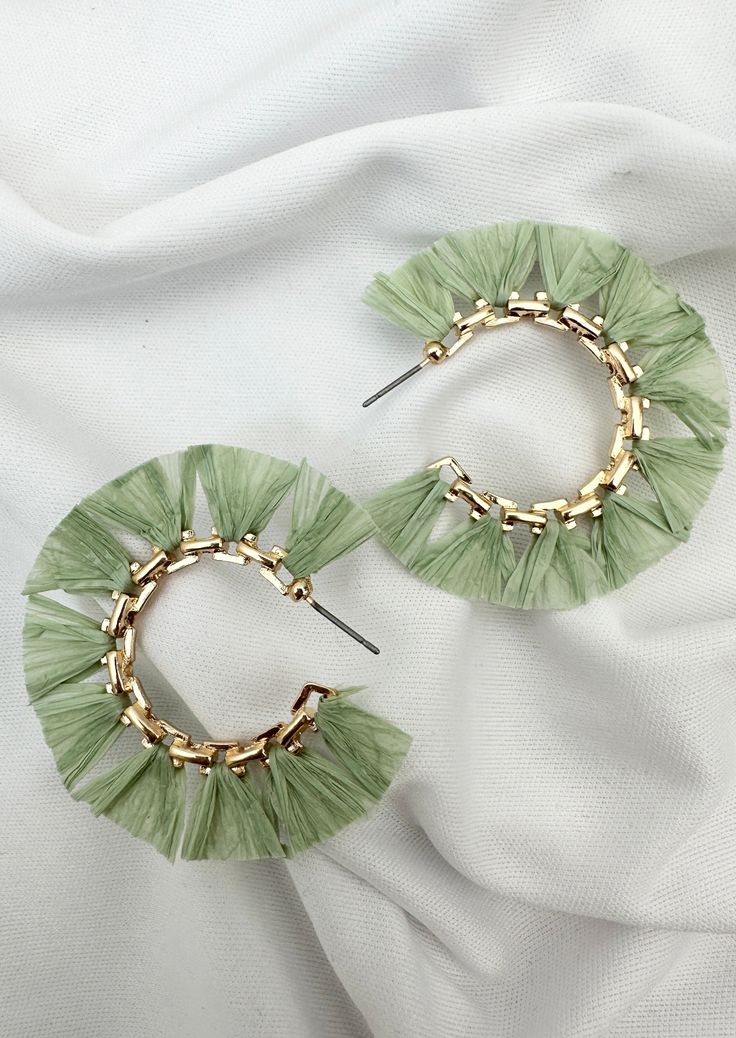 Raffia Hoop Earrings Mint green Gold metal Gold detailing Post entry Trendy Green Hoop Earrings For Beach, Trendy Green Hoop Earrings For Spring, Green Bohemian Beaded Hoop Earrings, Small Hoop Earrings For Beach Spring Season, Small Hoop Earrings For Spring Beach Days, Small Hoop Earrings For Beach In Spring, Summer Chic Hoop Earrings, Spring Beach Small Hoop Earrings, Chic Green Jewelry For Spring