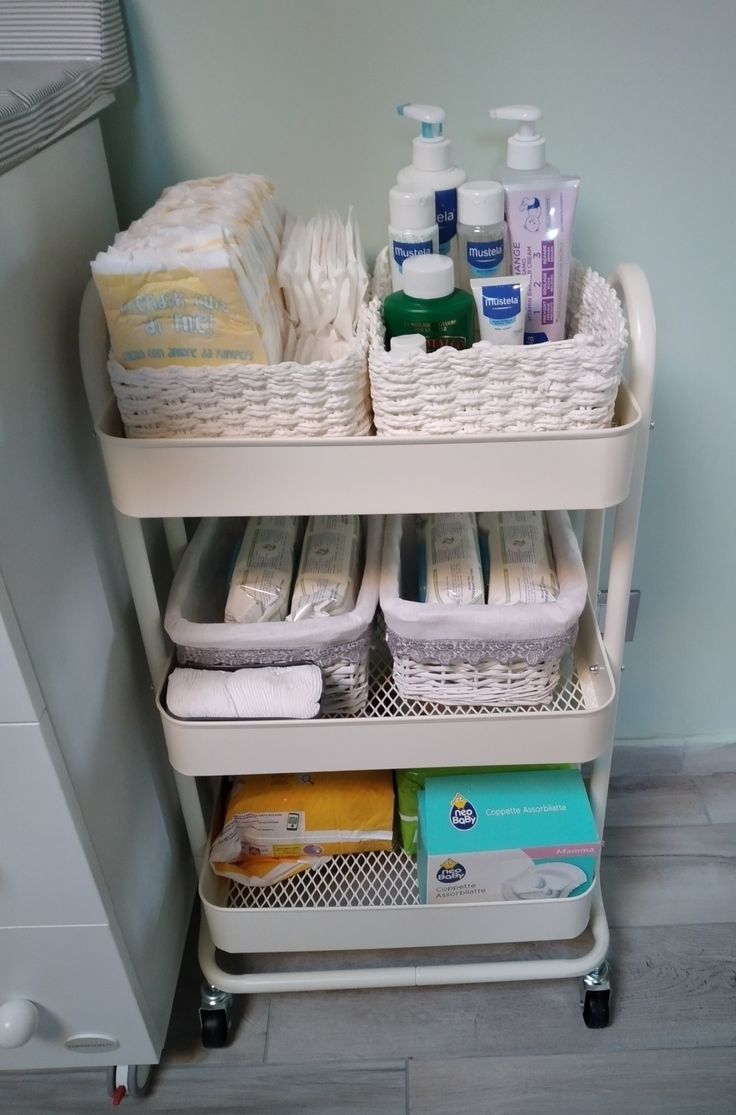 an organized bathroom shelf with toiletries and soaps