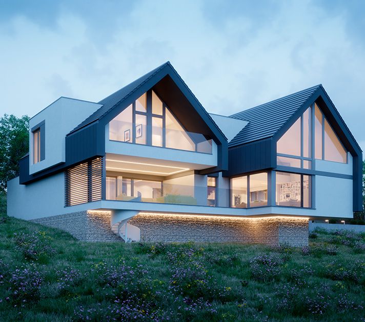 a large white house sitting on top of a lush green hillside