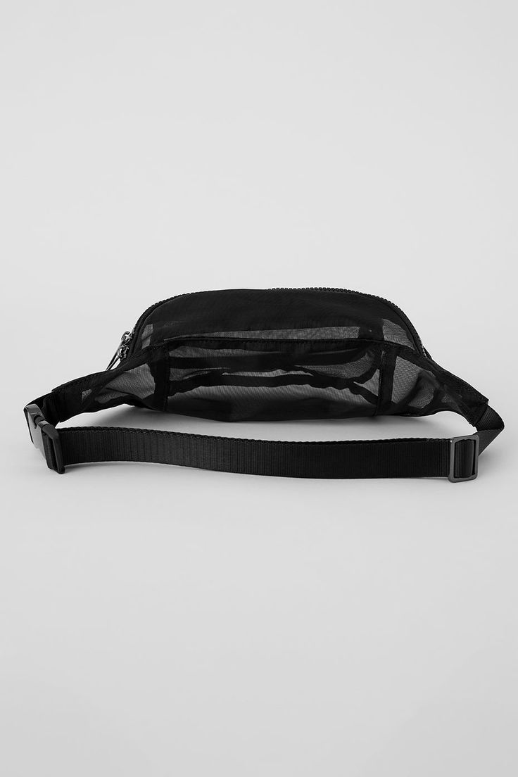 For everything from festivals to Friday morning coffee missions, you'll reach for the Sheer Fanny Pack. It's made from see-through, gently structured mesh with a roomy interior, 2 main compartments and a back pocket for stashing credit cards or keys. And thanks to the adjustable, clip-on buckle, you can style it slung across the chest or fastened at the waist depending on the mood. Functional Mesh Bags For Daily Use, Black Mesh Bags For Daily Use, Black Mesh Bag For Daily Use, Black Travel Bag With Mesh Lining, Travel Mesh Bags, Black Nylon Belt Bag With Functional Pockets, Black Nylon Belt Bag With Pockets, Black Mesh Bags, Black Mesh Bag For Outdoor Activities