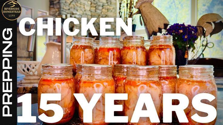 a bunch of jars filled with food sitting on top of a table