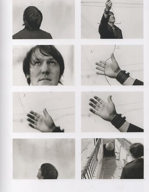 black and white photograph of hand gestures in various positions, including man holding something up to his face