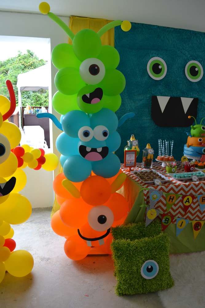 an image of a birthday party with monster balloons