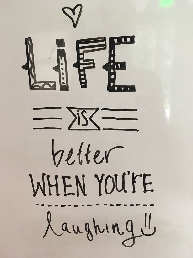 a white sign with writing on it that says life is better when you're laughing