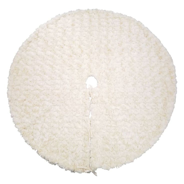 a white round rug with a hole in the middle on a white background, it is made out of fluffy material